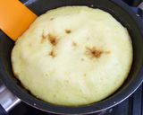A picture of step 11 of Pancake Mix Cinnamon Apple Cake in a Frying Pan.