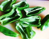 A picture of step 3 of Green Peppers Stuffed with Meat and Topped with Melted Cheese.