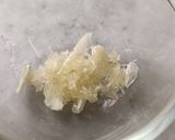 A picture of step 1 of Garlic Cheesy Maggi.