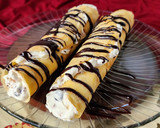 Foto del paso 7 de la receta: 🫔Panqueques rellenos de manzana, pasas y crema, bañados con salsa de chocolate🫔 Canelones dulces