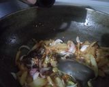 A picture of step 3 of Chilli potatoes flax and sesame seeds rice.