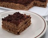 Foto del passaggio 14 della ricetta Dolce al caffè e mascarpone con cioccolato