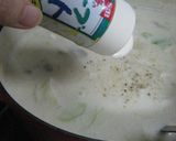 A picture of step 15 of Easy Rich Cream Stew in a Le Creuset Pot.