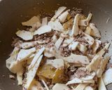 A picture of step 3 of Bamboo Shoot Savory Congee.