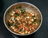 A picture of step 4 of Bhut jalokia naga chives chutney🔥.