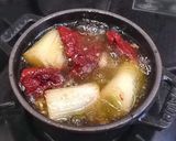 A picture of step 5 of Ajillo with Japanese Leek and Dried Tomatoes.