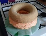 A picture of step 7 of Vickys Halloween Pumpkin Piñata Cake, Decorating Idea.