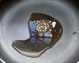 A picture of step 11 of Pavakkai /bitter gourd pitlai.