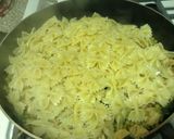 A picture of step 6 of Bow-Tie Cheesy Chicken With Peas And Spinach.
