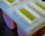 A picture of step 9 of Rainbow Popsicles.
