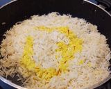 A picture of step 12 of Peeley Meethe Chawal.