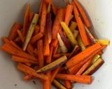 A picture of step 3 of Roasted Carrots with Thyme, Oregano, and Parsley.