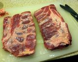 A picture of step 8 of Spiced Smoked Ribs with Orange Soda Sauce.