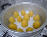 A picture of step 5 of Wo Wo Tou Steamed Dumplings.