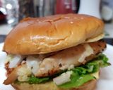 A picture of step 6 of My grilled Chicken burger with Bonfire smoked Chedder cheese.😘.