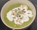 A picture of step 5 of Purslane Soup with Goat Cheese Whipped Cream and Hazelnut Oil.