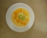 A picture of step 4 of Mango pulp with yorghut.