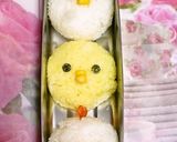 A picture of step 2 of Charaben: Chick and Rooster Onigiri.