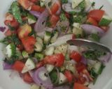 A picture of step 2 of Italian rustic cucumber and tomato salad.