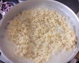 A picture of step 1 of Pork Ramen noodles.