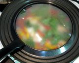 A picture of step 5 of Simple Acquapazza-style Salmon with Basil.