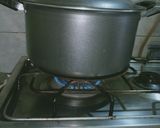 A picture of step 5 of Achari masoor pulao.