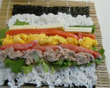 A picture of step 6 of Salad Roll (with rolling instructions).