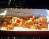 A picture of step 3 of Roasted Chicken, potatoes and veggies.