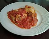 A picture of step 9 of Sausage Pasta Rollatini.