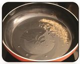 A picture of step 1 of Raw Mango Rice.