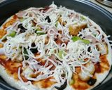 A picture of step 4 of Pizza pepperoni and chicken Nuggets.