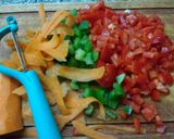 Foto del paso 4 de la receta: Pollo a la Naranja con Miel y Zapallitos Revueltos Tricolor