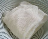 A picture of step 3 of Macrobiotic Homemade Tofu Made with Homemade Soy Milk.