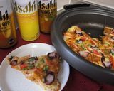 A picture of step 8 of Seafood Kimchi Rice Pizza.