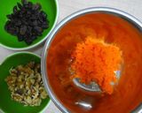 A picture of step 1 of Carrot Bread with Raisins & Walnuts.