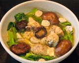 Hình bước làm 6 của món Canh Đùi Gà Nấu Nấm Và Cải Bẹ Xanh