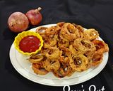 A picture of step 3 of Red Onion Ring Fritters.