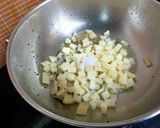 A picture of step 2 of Moringa Leaves and Potato Subzi.