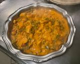A picture of step 18 of Chicken and Bacon with Peppers, Tomatoes, Spices, and Coconut Milk.