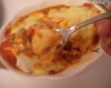 A picture of step 8 of Cheesy Enchiladas.