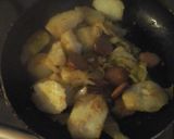A picture of step 5 of Cabbage with fried potatoes and smoked sausage.