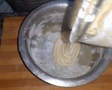 A picture of step 3 of Eggless Doll cake pineappple flavour.