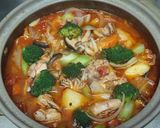 A picture of step 6 of Tomato Hot Pot.