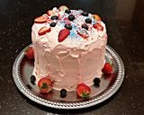 A picture of step 16 of White Butter Cake with Strawberry and Blueberry Whipped Cream.