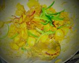 A picture of step 3 of Indian spicy chicken with potato.