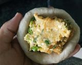 A picture of step 4 of Alu paneer paratha serve with boondi raita.