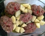 A picture of step 3 of Oven baked turkey burgers and potatoes.