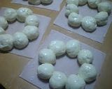 A picture of step 2 of Plain or Chocolate Pon-De-Ring Style Donuts.