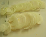 Foto del paso 4 de la receta: Solomillo de cerdo macerado y guarnición al horno