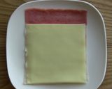 A picture of step 2 of A Cute Bento Item: Crabstick and Cheese Rolls.